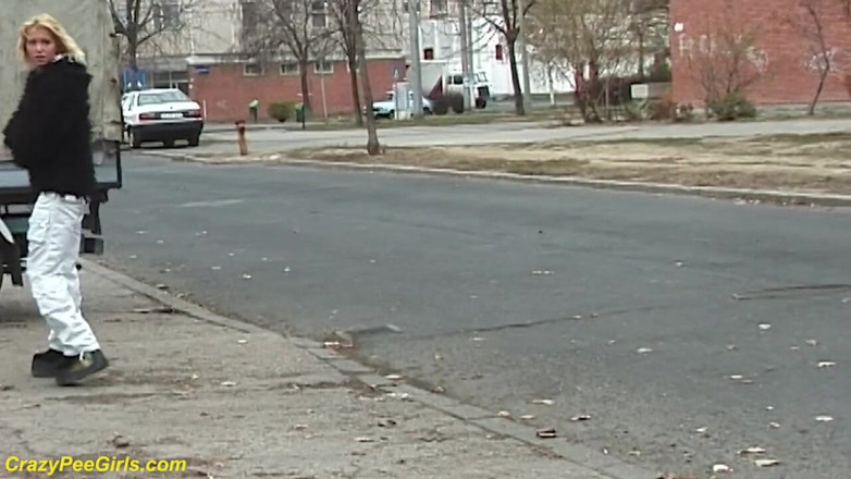 Crazy pee girls: Young girl pissing on street