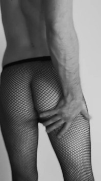 Sexy teen boy dances with only fishnets tease