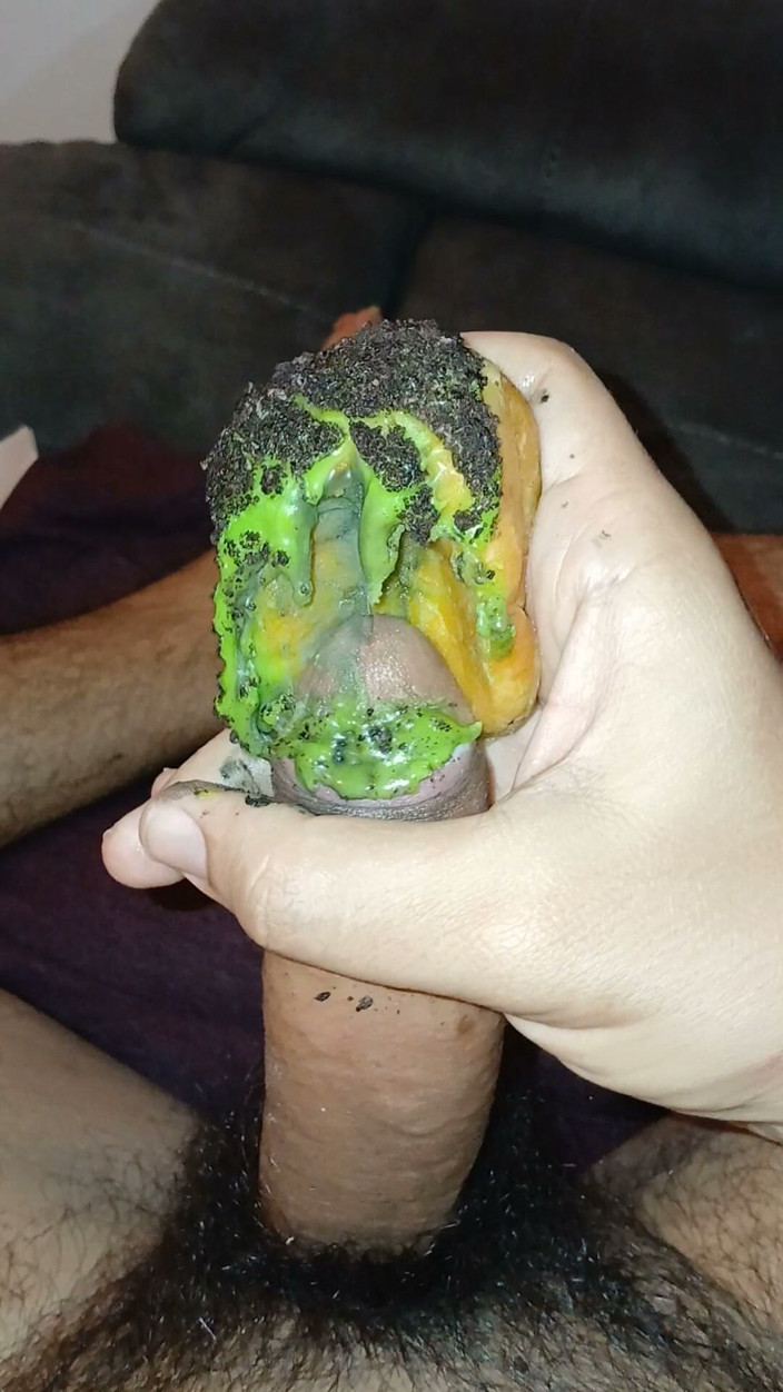 Alexander33324: Enjoying a Donut with Haloween Decoration.