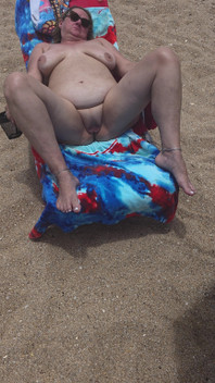 Laying with My Shaved Big Pussy Spread Wide Open on the Nude Beach to Tease Those Walking by and Looking BBW Swinger Wife Feet