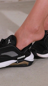 Still Inside - Dangling Nylons in Sneakers