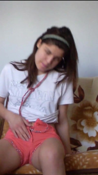 Sexy Teen Weting Her Pants and Fingering Her Pussy