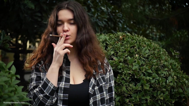 Russian Smokers: Sweet and Busty Russian Babe Smoking Cigarette in Nature