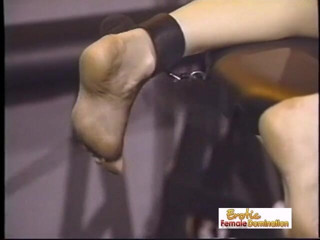 Erotic Lezdom: Brunette domina whips her slave