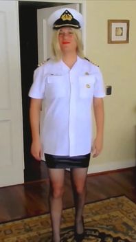 Crossdresser Navy Captain Fernanda Gomez in Mini Skirt