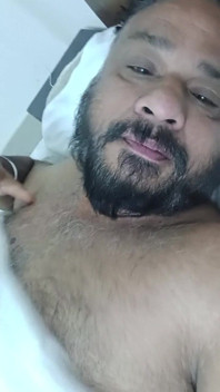 Indian Daddy Lying on the Bed Teasing and Posing for You