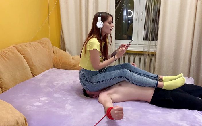 Petite Princesses FemDom (PPFemdom): Sofi fullweight jeanssitting on tied slave and listens to music...