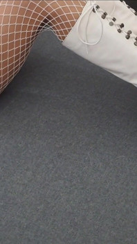 Perfect-assed MILF in High-heeled Boots and Fishnet Stockings