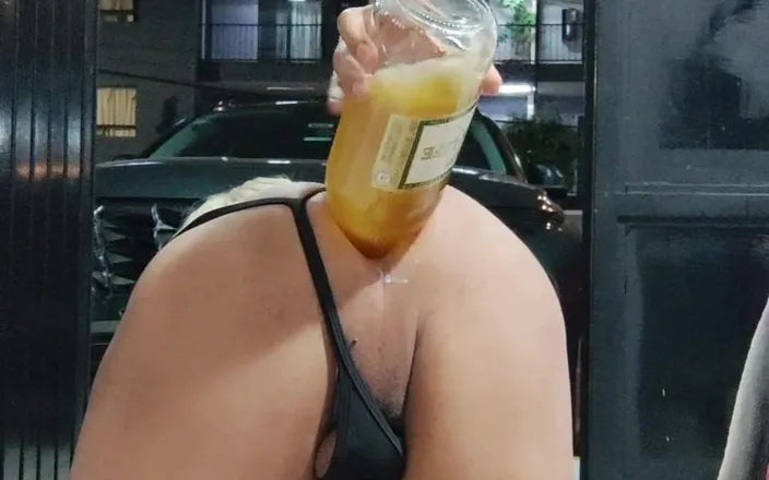 Traviezisha: Sissy in Chastity Trying to Drink a Full Bottle via...