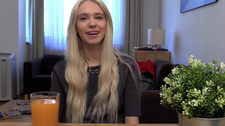 Bitch hunter: Blonde Babe Grips Purple Vibrator with Naughty Smile