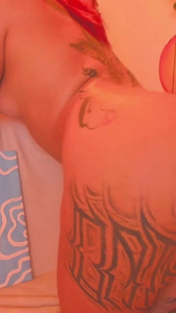 A Latina with a Tattooed Body Is Shaking Her Butt for You