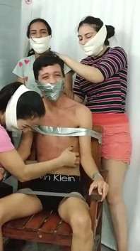 Chair Bound and Tickled by Three Microfoamly Tape Gagged Girls!