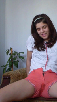 Sexy Teen Has Full Bladder and She Is Desperate to Pee so She Empty Her Bladder in Her Short Pants