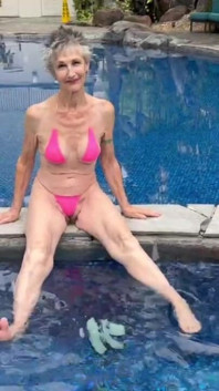 By the Hotel Pool in My Skimpy Pink Bikini