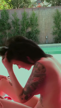 Poolside Pussy Licking - Tattooed Black-haired Beauty Eats a Blonde in a Bikini