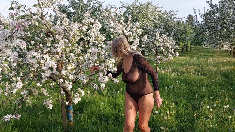 martinawest: Mature Woman Is Walking Around Outside in a See-through Bodysuit!