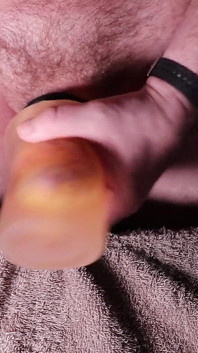 Masturbazione con un sex toy e sborrata al rallentatore