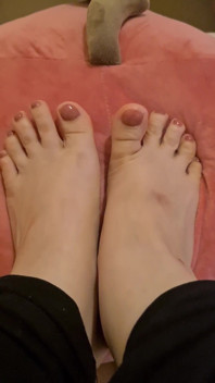 Freshly Painted and Oiled Toenails