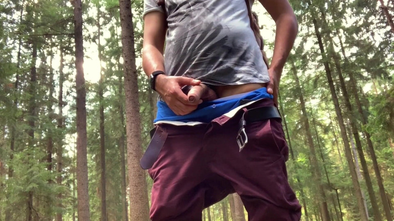 Fratchino: Horny guy works on his cock in the woods