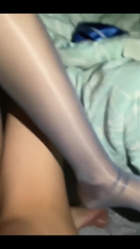 The Temptation of Blue Shiny Silk: the Secret Tease Under the Gloss