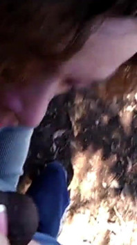 Sucking Black Cock in the Bushes