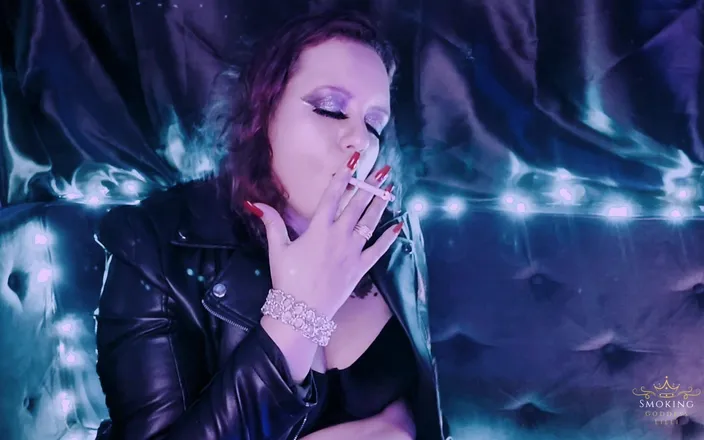 Lilli Cukierek Cox: Smoking Wearing a Leather Jacket