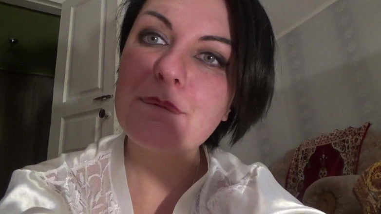 Sexy Milf: Sexy housewife in silk white robe desperating to pee long...