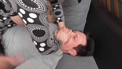 Femdom Austria: Stifling her slave on the couch