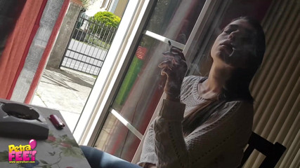Smokin Fetish: Gorgeous brunette teasing everyone with her smoking