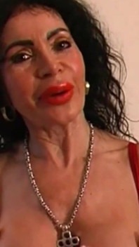 This Slutty MILF Shows Us Her Ass and Masturbates for Us in Front of the Camera