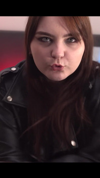 Pretty Woman in a Leather Jacket Dancing Before Sex