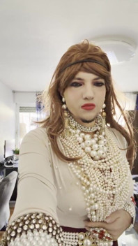 Crossdresser Walking Around the Apartment Showing High Heels and Lovely Pearls