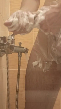 A Young Guy Washes in the Shower and Dreams of Someone Being Next to Him