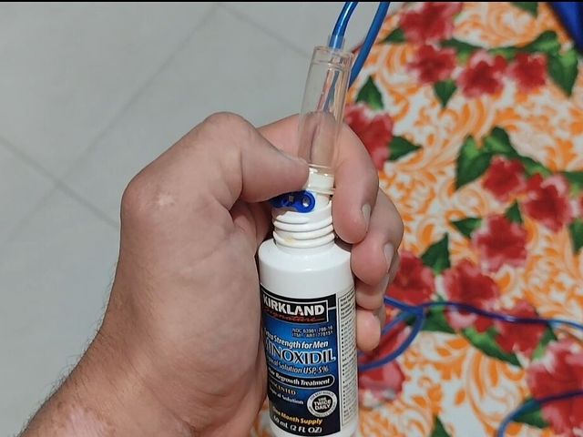 To Greatly Enlarge the Penis, the Young Straight Man Applies Minoxidil Directly to the Glans (Big Dick Red)
