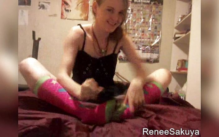 Renee Sakuyas Studio: Tickling feet with feather on bed, wearing long knee socks