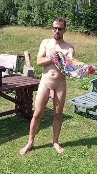 Jerking off While Hanging Out the Laundry
