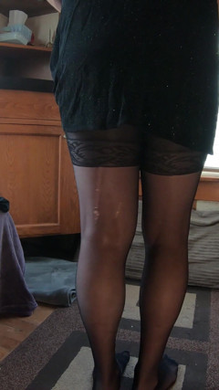 A Trans Lady in a Sparkly Dress and Pantyhose Shows Her Bum in Her Fitting Room thumbnail