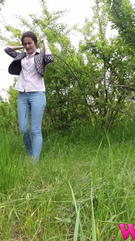 Desperate Girl Full Bladder Trying to Pee in the Forest and Smelling the Flowers