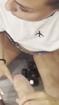 She Licks the Dick Before Hiding It in Her Cheek