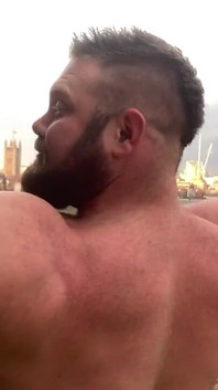 Builder Iron Bending Muscle Flexing and Measuring
