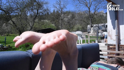 Czech Soles - foot fetish content: Flip flops and long toes relax on terrace