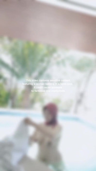 Woman Hijab Bathing Naked in an Open-air Hotel Pool