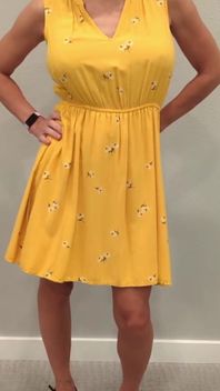 Stella in a Yellow Sun Dress with Black Heels