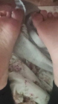 Playing with Friends Soles, While She's Reading.