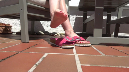 Lady Victoria Valente: Shoe play, toe wiggling, wrinkled soles on the garden terrace