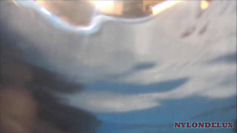 Nylondelux: Seamless Pantyhose Anal Plug at the Pool