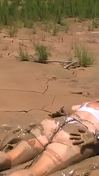 Julie Cunningham in Lingerie Wriggles Hard in Mud Hogtied with Chains. Sploshing Dirty Whore. Huge Tits Covered in Mud.