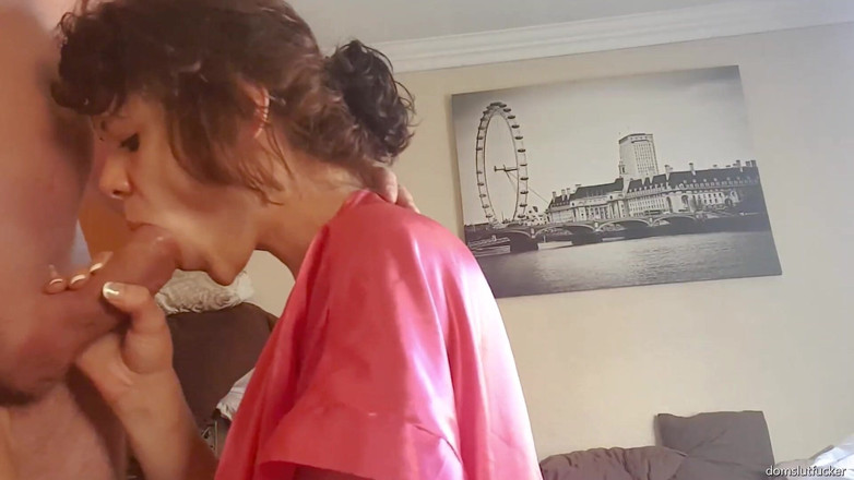 domslutfucker: Girl in Pink Robe Sucking Cock and Giving Handjob Till...