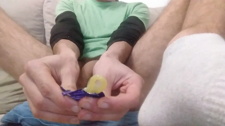 Elvissc: Handsome Amateur with Fat Cock Plays with Putting the Condom...