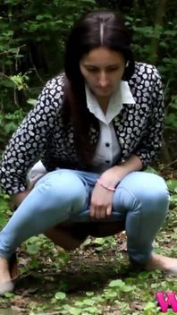 Skinny Brunette Desperate to Pee in the Woods Has to Find a Way to Empty Her Bladder